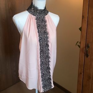 Sleeveless, high neck top